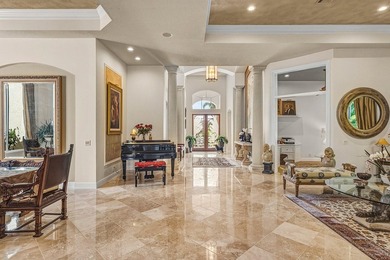 Exceptional single-story residence available in Ballenisles on BallenIsles Golf and Country Club in Florida - for sale on GolfHomes.com, golf home, golf lot