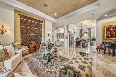 Exceptional single-story residence available in Ballenisles on BallenIsles Golf and Country Club in Florida - for sale on GolfHomes.com, golf home, golf lot