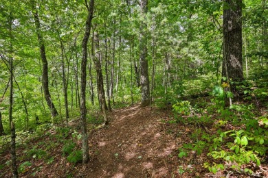 Discover the best of mountain living at 108 Uplands, an on High Hampton Inn and Country Club in North Carolina - for sale on GolfHomes.com, golf home, golf lot
