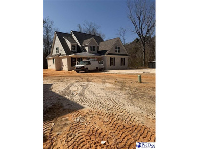 Step into timeless elegance with this new construction home by on The Traces Golf Club in South Carolina - for sale on GolfHomes.com, golf home, golf lot