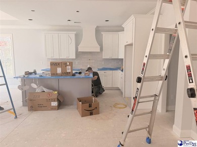 Step into timeless elegance with this new construction home by on The Traces Golf Club in South Carolina - for sale on GolfHomes.com, golf home, golf lot