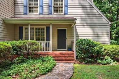 Decompress as this home is nestled on a quiet Cul-de-sac, across on Sedgefield Golf Course in North Carolina - for sale on GolfHomes.com, golf home, golf lot