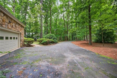 Decompress as this home is nestled on a quiet Cul-de-sac, across on Sedgefield Golf Course in North Carolina - for sale on GolfHomes.com, golf home, golf lot