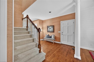 Decompress as this home is nestled on a quiet Cul-de-sac, across on Sedgefield Golf Course in North Carolina - for sale on GolfHomes.com, golf home, golf lot