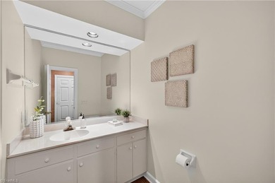 Decompress as this home is nestled on a quiet Cul-de-sac, across on Sedgefield Golf Course in North Carolina - for sale on GolfHomes.com, golf home, golf lot