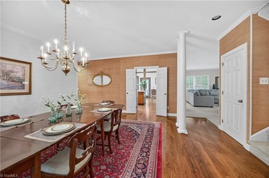 Decompress as this home is nestled on a quiet Cul-de-sac, across on Sedgefield Golf Course in North Carolina - for sale on GolfHomes.com, golf home, golf lot