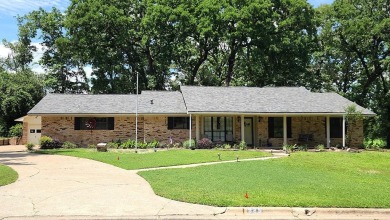 Located on the 9th Fairway and among the trees of the beautiful on Woodland Hills Golf Club in Texas - for sale on GolfHomes.com, golf home, golf lot