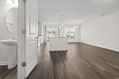 Welcome to this beautifully maintained 3-bedroom, 2.5-bath on Wild Wing Plantation in South Carolina - for sale on GolfHomes.com, golf home, golf lot