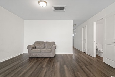 Welcome to this beautifully maintained 3-bedroom, 2.5-bath on Wild Wing Plantation in South Carolina - for sale on GolfHomes.com, golf home, golf lot