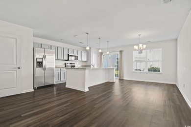 Welcome to this beautifully maintained 3-bedroom, 2.5-bath on Wild Wing Plantation in South Carolina - for sale on GolfHomes.com, golf home, golf lot