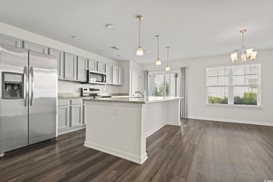 Welcome to this beautifully maintained 3-bedroom, 2.5-bath on Wild Wing Plantation in South Carolina - for sale on GolfHomes.com, golf home, golf lot