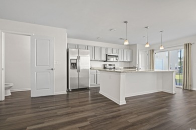 Welcome to this beautifully maintained 3-bedroom, 2.5-bath on Wild Wing Plantation in South Carolina - for sale on GolfHomes.com, golf home, golf lot