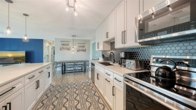 Welcome to a home that feels like it's been pulled straight from on Jacaranda West Country Club in Florida - for sale on GolfHomes.com, golf home, golf lot
