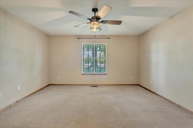 Red brick ranch style home with cedar accents located in Surrey on Golf Club At Surrey Hills in Oklahoma - for sale on GolfHomes.com, golf home, golf lot