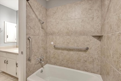 Red brick ranch style home with cedar accents located in Surrey on Golf Club At Surrey Hills in Oklahoma - for sale on GolfHomes.com, golf home, golf lot