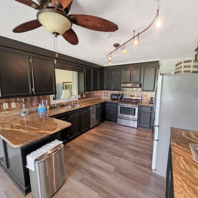 Live the lake and golf life at 119 Saluda Drive, located in the on Santee-Cooper Country Club in South Carolina - for sale on GolfHomes.com, golf home, golf lot
