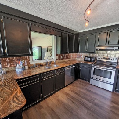 Live the lake and golf life at 119 Saluda Drive, located in the on Santee-Cooper Country Club in South Carolina - for sale on GolfHomes.com, golf home, golf lot
