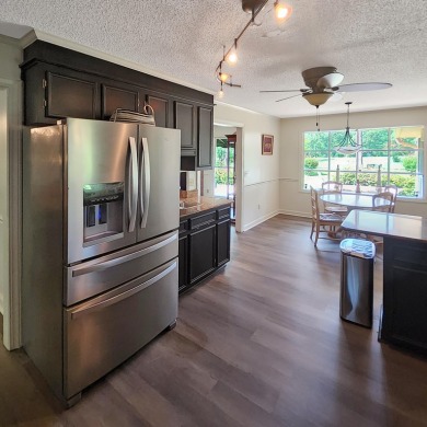 Live the lake and golf life at 119 Saluda Drive, located in the on Santee-Cooper Country Club in South Carolina - for sale on GolfHomes.com, golf home, golf lot