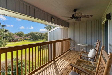 Wonderful end unit in Caswell Dunes overlooking the golf course on Oak Island Golf Club in North Carolina - for sale on GolfHomes.com, golf home, golf lot