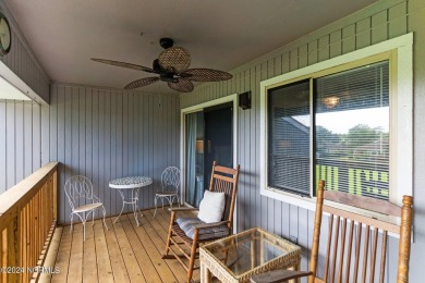 Wonderful end unit in Caswell Dunes overlooking the golf course on Oak Island Golf Club in North Carolina - for sale on GolfHomes.com, golf home, golf lot