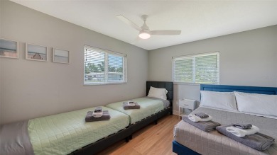 Welcome to a home that feels like it's been pulled straight from on Jacaranda West Country Club in Florida - for sale on GolfHomes.com, golf home, golf lot