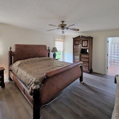 Live the lake and golf life at 119 Saluda Drive, located in the on Santee-Cooper Country Club in South Carolina - for sale on GolfHomes.com, golf home, golf lot
