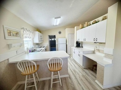 Welcome to Spanish Lakes Fairways! This elegant and tidy home on Spanish Lakes Fairways in Florida - for sale on GolfHomes.com, golf home, golf lot