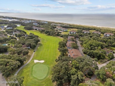 Wonderful end unit in Caswell Dunes overlooking the golf course on Oak Island Golf Club in North Carolina - for sale on GolfHomes.com, golf home, golf lot