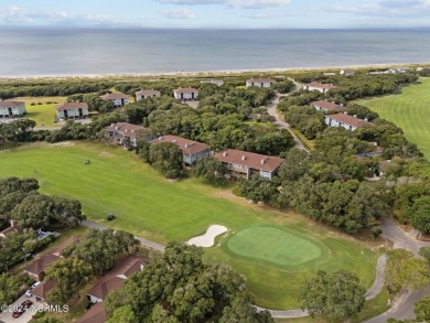 Wonderful end unit in Caswell Dunes overlooking the golf course on Oak Island Golf Club in North Carolina - for sale on GolfHomes.com, golf home, golf lot