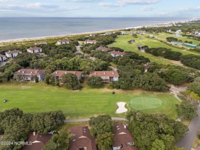 Wonderful end unit in Caswell Dunes overlooking the golf course on Oak Island Golf Club in North Carolina - for sale on GolfHomes.com, golf home, golf lot