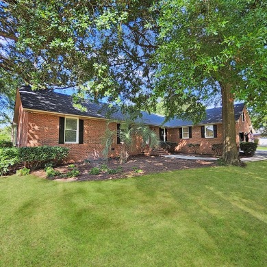 Live the lake and golf life at 119 Saluda Drive, located in the on Santee-Cooper Country Club in South Carolina - for sale on GolfHomes.com, golf home, golf lot