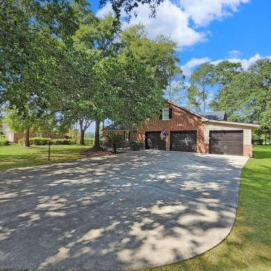 Live the lake and golf life at 119 Saluda Drive, located in the on Santee-Cooper Country Club in South Carolina - for sale on GolfHomes.com, golf home, golf lot