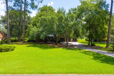 Live the lake and golf life at 119 Saluda Drive, located in the on Santee-Cooper Country Club in South Carolina - for sale on GolfHomes.com, golf home, golf lot