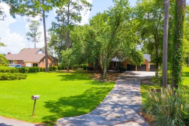Live the lake and golf life at 119 Saluda Drive, located in the on Santee-Cooper Country Club in South Carolina - for sale on GolfHomes.com, golf home, golf lot