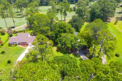 Live the lake and golf life at 119 Saluda Drive, located in the on Santee-Cooper Country Club in South Carolina - for sale on GolfHomes.com, golf home, golf lot