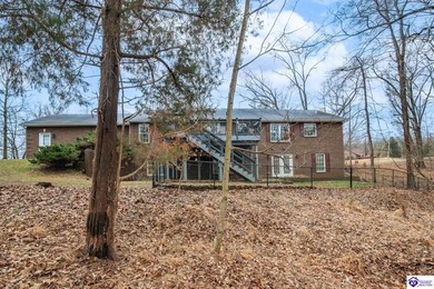 Welcome to this spacious custom built ranch home in the private on Doe Valley Country Club in Kentucky - for sale on GolfHomes.com, golf home, golf lot