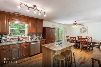 Discover comfort, convenience, and tranquil mountain living at on Sapphire National Golf Club in North Carolina - for sale on GolfHomes.com, golf home, golf lot
