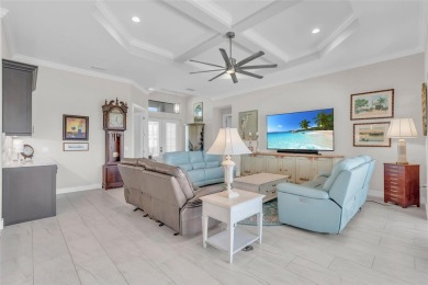 This exceptional residence, situated on the 13th hole of Twin on Twin Isles Country Club in Florida - for sale on GolfHomes.com, golf home, golf lot