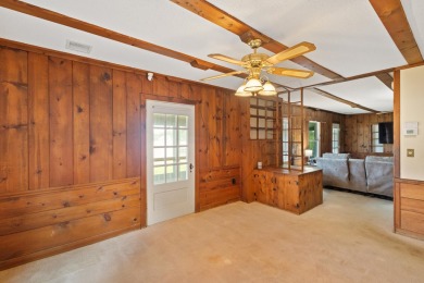 Rare opportunity on all-sports Goguac Lake! This 3-bedroom, 2 on Battle Creek Country Club in Michigan - for sale on GolfHomes.com, golf home, golf lot