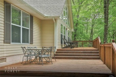 Discover comfort, convenience, and tranquil mountain living at on Sapphire National Golf Club in North Carolina - for sale on GolfHomes.com, golf home, golf lot