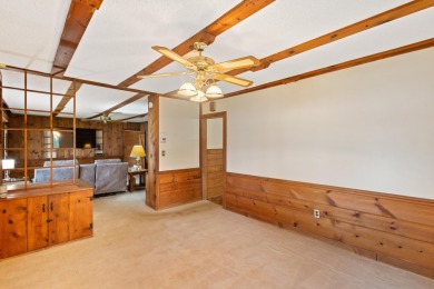 Rare opportunity on all-sports Goguac Lake! This 3-bedroom, 2 on Battle Creek Country Club in Michigan - for sale on GolfHomes.com, golf home, golf lot
