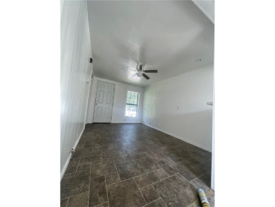 This cozy home is convenient and nicely situated in central on Alice Municipal Golf Course in Texas - for sale on GolfHomes.com, golf home, golf lot