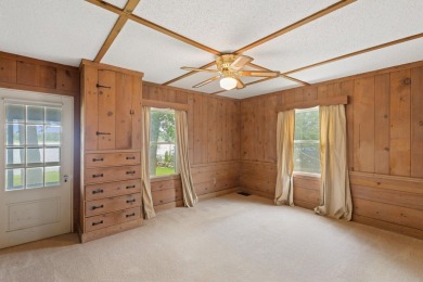 Rare opportunity on all-sports Goguac Lake! This 3-bedroom, 2 on Battle Creek Country Club in Michigan - for sale on GolfHomes.com, golf home, golf lot