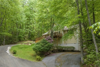 Discover comfort, convenience, and tranquil mountain living at on Sapphire National Golf Club in North Carolina - for sale on GolfHomes.com, golf home, golf lot
