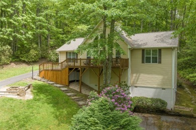 Discover comfort, convenience, and tranquil mountain living at on Sapphire National Golf Club in North Carolina - for sale on GolfHomes.com, golf home, golf lot