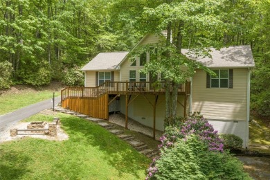 Discover comfort, convenience, and tranquil mountain living at on Sapphire National Golf Club in North Carolina - for sale on GolfHomes.com, golf home, golf lot