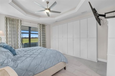 This exceptional residence, situated on the 13th hole of Twin on Twin Isles Country Club in Florida - for sale on GolfHomes.com, golf home, golf lot