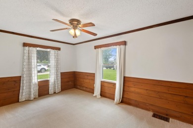 Rare opportunity on all-sports Goguac Lake! This 3-bedroom, 2 on Battle Creek Country Club in Michigan - for sale on GolfHomes.com, golf home, golf lot