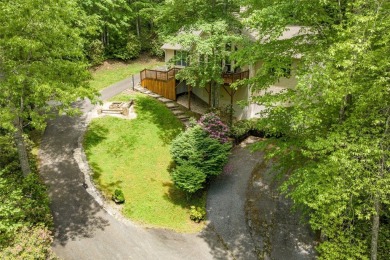 Discover comfort, convenience, and tranquil mountain living at on Sapphire National Golf Club in North Carolina - for sale on GolfHomes.com, golf home, golf lot