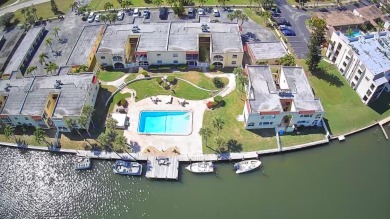 Experience the Magic of Waterfront Living at Spanish Trace on Cocoa Beach Country Club in Florida - for sale on GolfHomes.com, golf home, golf lot